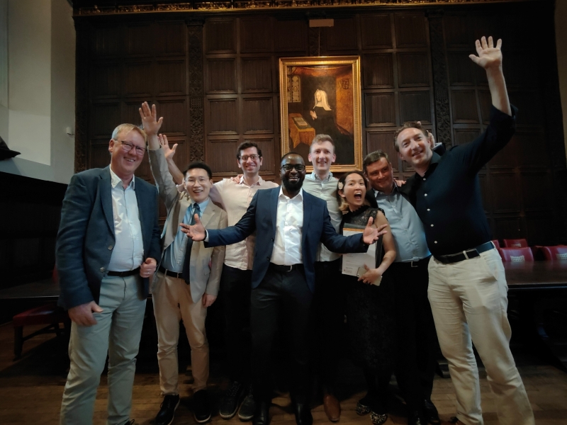 Fig. 1. Group photo at St. John's College dinner.